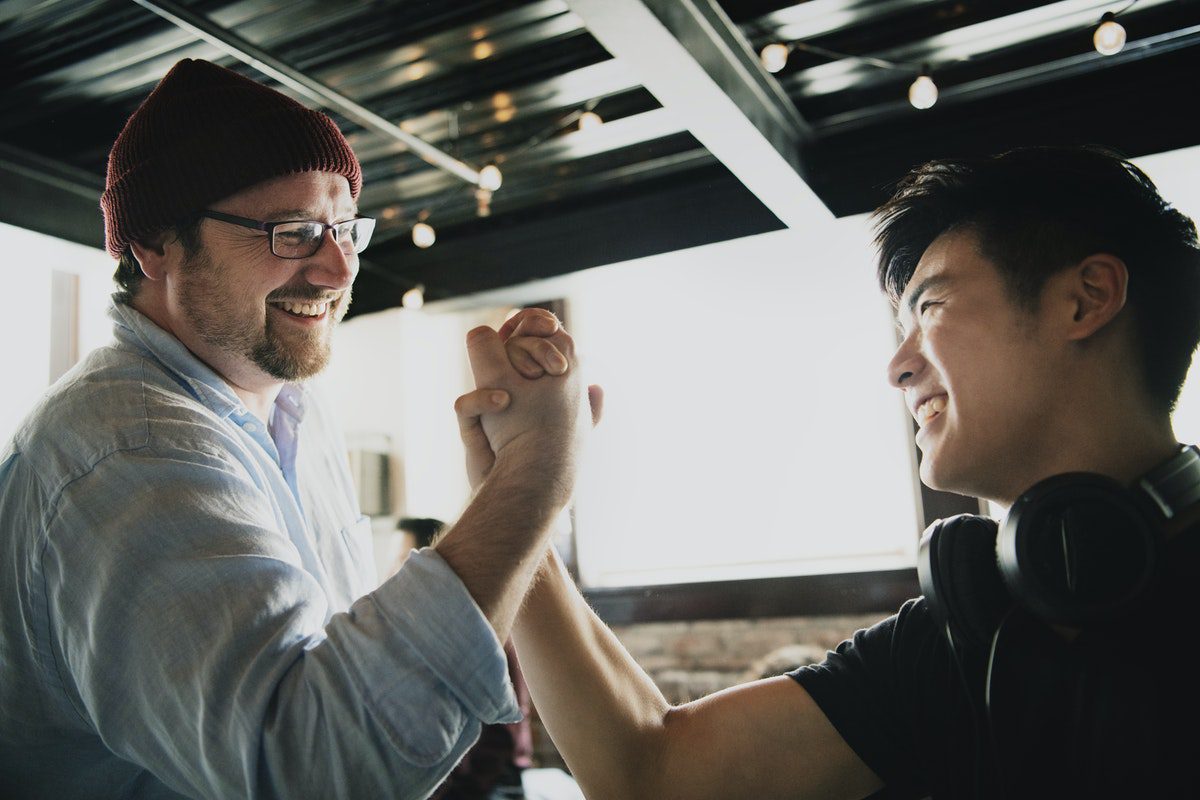 two-men-armwrestling-jaywalker