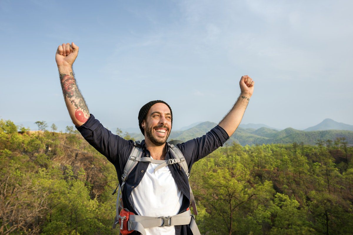 man-hiking-happy-jaywalker