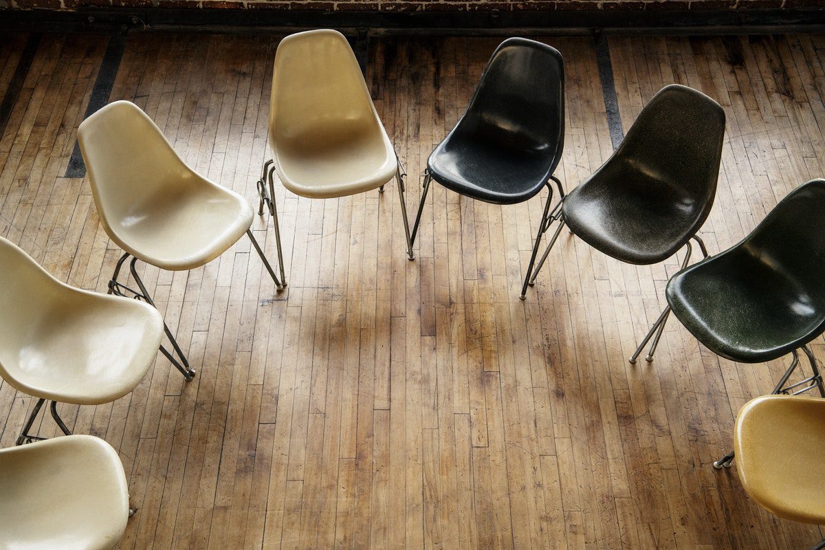 empty chairs in a circle for therapy